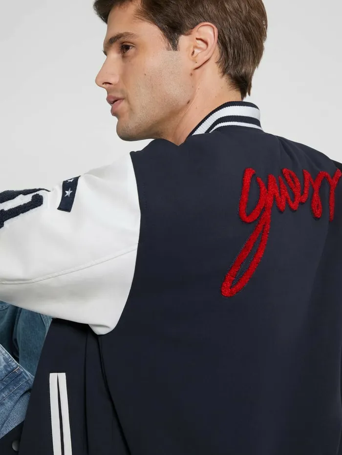 Jackets and Coats GUESS Men Bear Varsity Jacket Bleu lgant Jackets and Coats GUESS Men Bear Varsity Jacket Bleu lgant