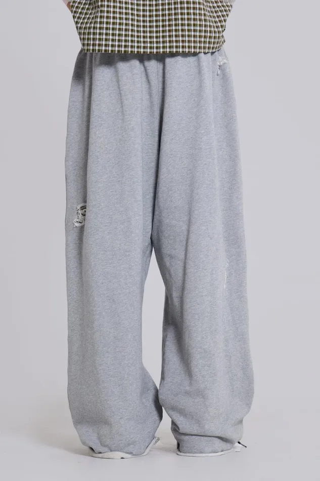 Jaded London Joggers and Sweatpants MenUnisex Distressed Grey Marl Baggy Monster Joggers Grey